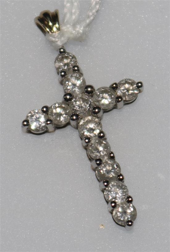 A 9ct gold and diamond set cross pendant, 1in inc. bale.